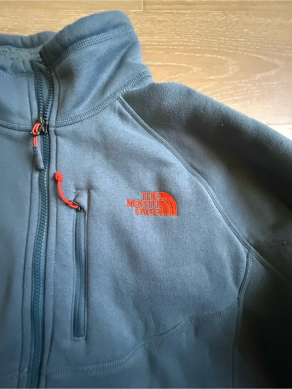 The North Face Men’s Blue Full-Zip Fleece Jacket with Orange Accents